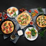 Delicious,Fresh,Pizzas,Variety,With,Different,Souces,And,Vegetables.,Homemade